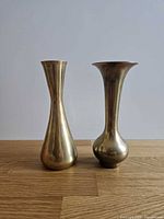 Both brass bud vases front view