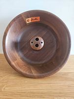 Top view of walnut nut bowl showing overall form and central stem