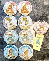 Full set of plaques and heart ornament displayed