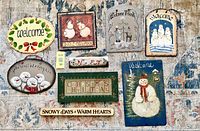 All nine Christmas plaques laid out for overview