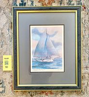 Framed print showing full frame, matting and artwork