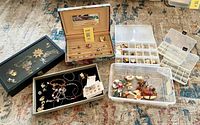 All containers with assorted jewelry pieces