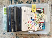 Overview of tote with albums, refill pages and sticker sheets