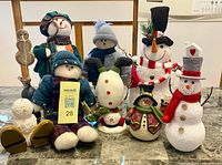 Group shot of all nine snowman decor items