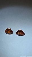 Both orange spessartite garnets side by side