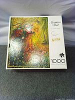 Front of puzzle box showing artwork, piece count and branding