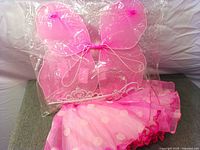 Pink wings packaged with tutu and tiara