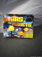 Front of Stars and Planets toy box showing product graphics and components
