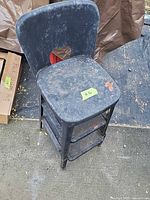 Front view of metal step stool chair