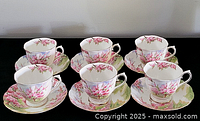 Set of six Royal Albert Blossom Time cups with saucers