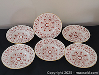 Six matching Rougemont soup bowls displayed