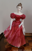 Front view of Royal Doulton Winsome figurine showing gown and posture