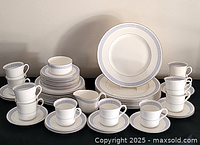 Full view of Royal Worcester Chelsea set showing plates, bowls, cups, saucers, creamer and sugar bowl