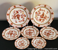 All seven Wedgwood plates displayed – two large at back, four medium and one small at front