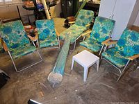 Full set: chaise, four chairs, umbrella in sleeve, small white side table (table excluded)