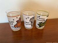 Front view of all three cartoon animal glasses