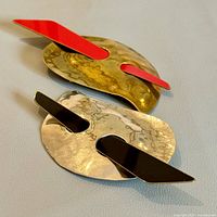 Two modernist brooches full view