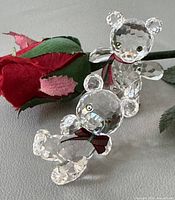 Both crystal bears with rose for scale