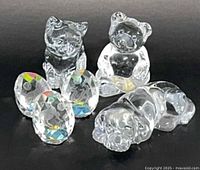 Group shot of all six clear glass and lead crystal pieces