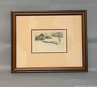 Full view of framed etching showing frame, matting and artwork