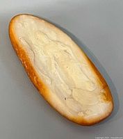 Obverse showing carved Guanyin relief on stone