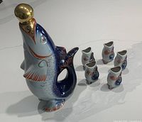 Full set showing decanter and five cups