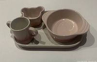 Top view showing all four pieces: ramekin, mug, bowl, tray