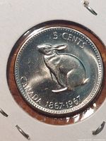 Reverse side showing rabbit and dates