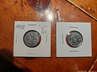 Both Victory nickels in 2x2 cardboard holders