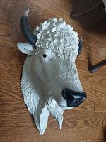 Front angled view of white buffalo resin head