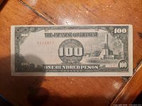 Front view of the 100 pesos Japanese occupation note