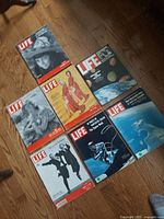 Eight Life magazines laid out showing all covers