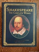 Front cover showing title, portrait and decorative border