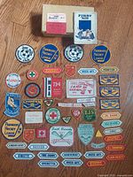 All patches spread out with box and booklet visible