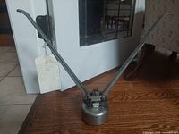 Full view of Rieke FS600 crimper standing upright showing dual handles