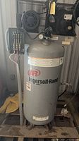 Full view of Ingersoll Rand vertical compressor on pallet
