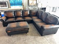 Full view L-shaped sectional and ottoman