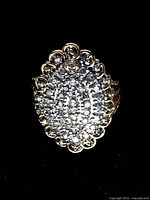 Front view of diamond cluster ring