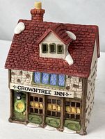 Front view of Crowntree Inn porcelain building showing storefront, façade and roof