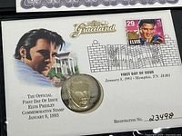 Envelope with silver coin, stamp, registration number