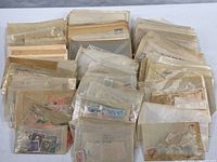 Large grouping of glassine envelopes filled with stamps