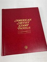 Front cover of red album titled American Artist Stamp Panels