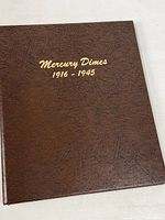 Front cover of brown binder titled Mercury Dimes 1916-1945