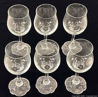 Six Rosenthal crystal wine glasses displayed top view