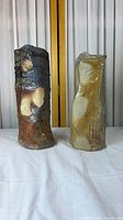 Both Bizen pottery vases side by side on table