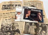 Lot overview showing newspapers and three magazines