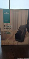Front of retail box showing Borlway Shiatsu Massage Cushion with Heat