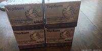 Four shrink-wrapped TopSum Calming Pheromone refill boxes stacked two by two