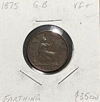 Reverse side of 1875 farthing in 2x2 flip showing seated Britannia and handwritten annotations