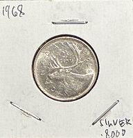 Reverse showing caribou design and date 1968